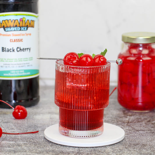 Black Cherry Whiskey Sour garnished with 3 maraschino cherries
