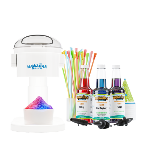 Front view of S700 machine with rainbow snow cone (red, purple, and blue), in ice mold directly below it. To the left is a front view of 3 16-oz pints, which are Cherry (Red), Blue Raspberry (Blue) and Grape (Purple). Below these pints are three black bottle pourers. To the left and slightly behind of the pints is a stack of green snow cone cups. Behind the pints are a display of spoon straws.
