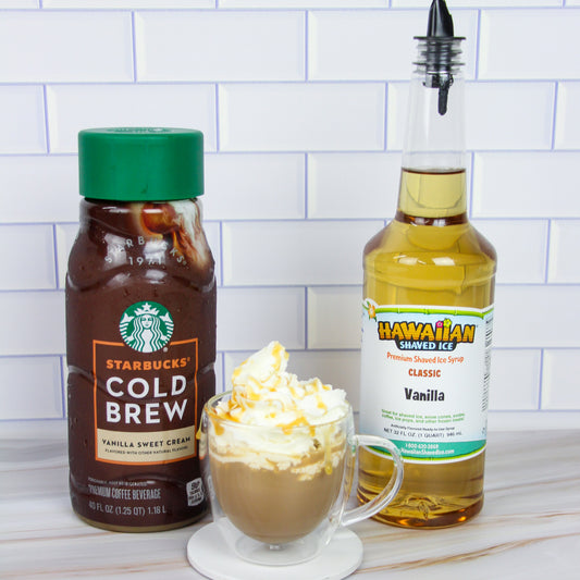 Vanilla flavored Starbucks cold brew topped with whipped cream and caramel sauce